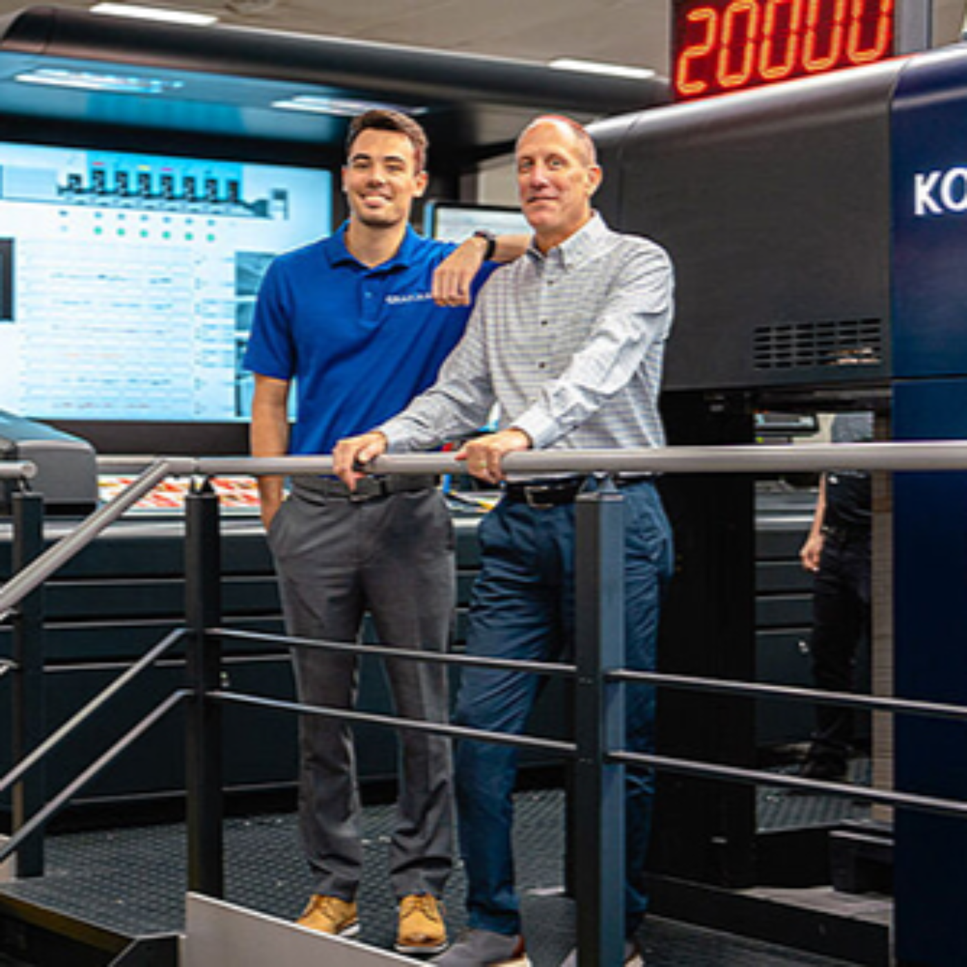 Bernie Elzer III, President and CEO, and Nathan Elzer, Process Integration Specialist at Grafika Printing
